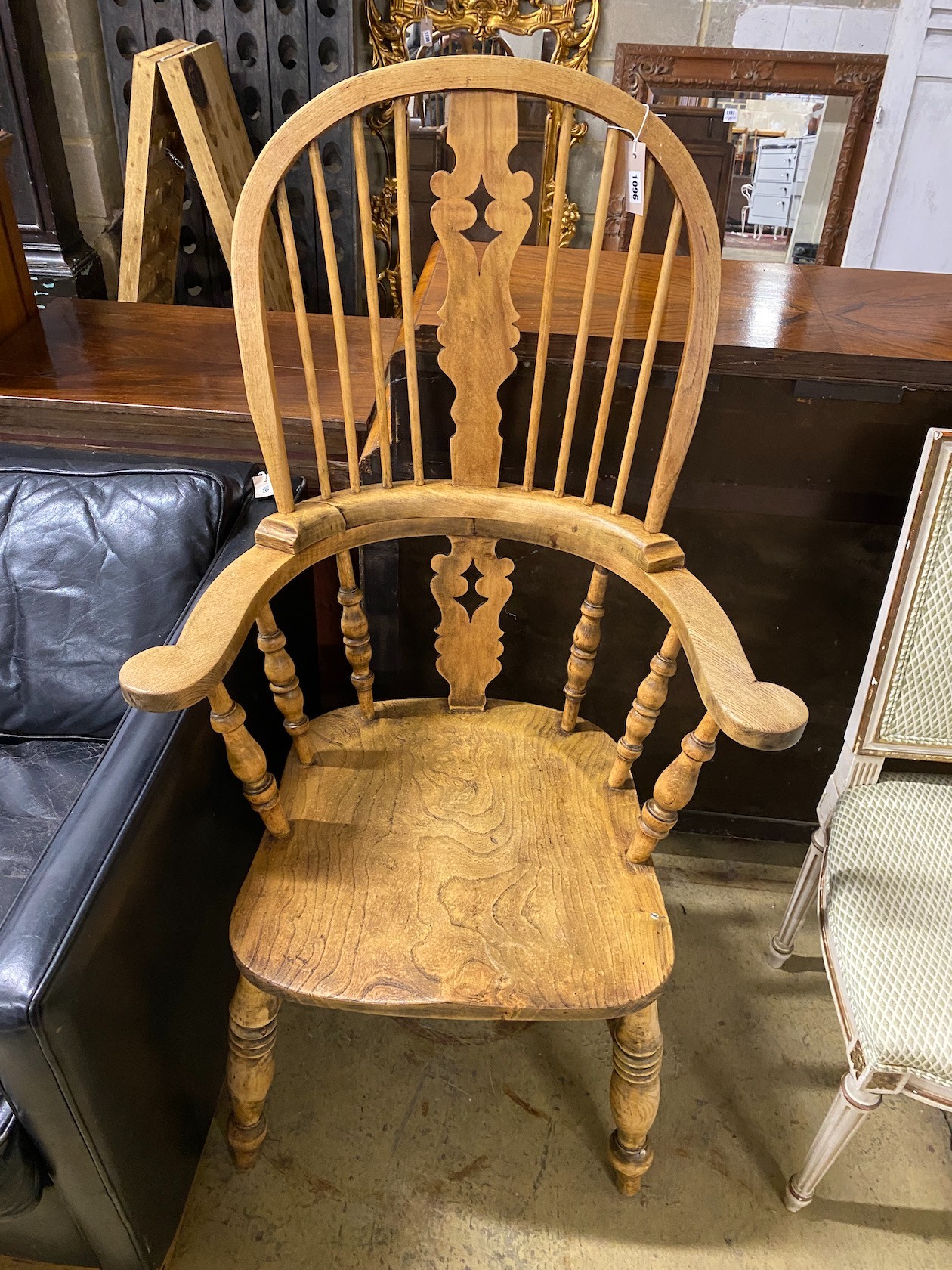 A bleached elm and beech Windsor armchair, width 69cm, depth 50cm, height 126cm